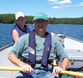 Photo of Nigel Lester rowing a boat